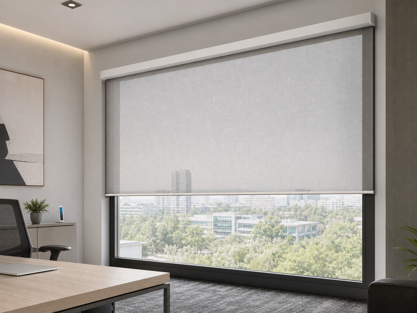 Motorized roller shade installed in a modern commercial office